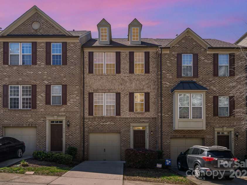 243 Lincoln Street, Charlotte, NC 28203.  MLS# CAR4259345, YatesRealty ID 17251. Twilight Front Elevation