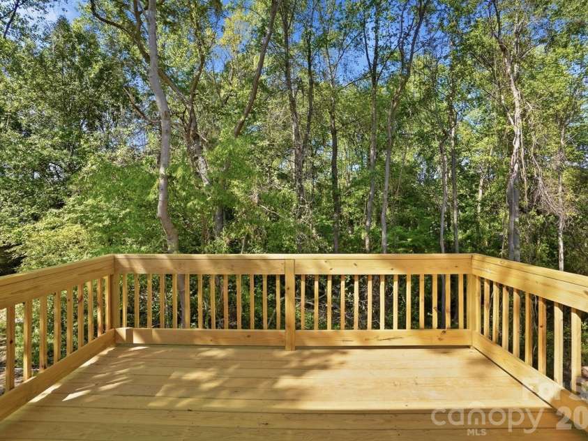 1741 Moss Court, Gastonia, NC 28054.  MLS# CAR4368108, YatesRealty ID 17252. Large back deck overlooking gently sloping yard.