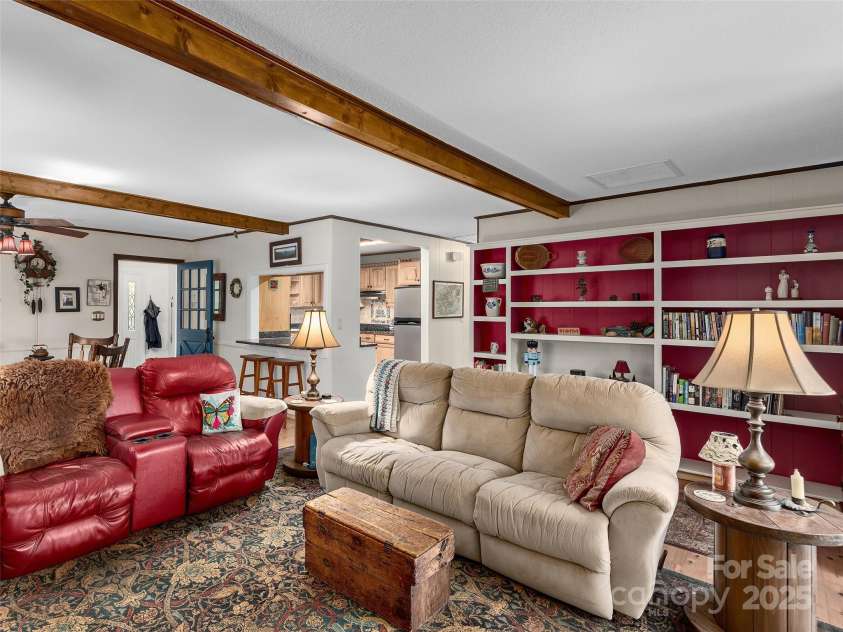 573 Valeria Lane, Pisgah Forest, NC 28768.  MLS# CAR4266219, YatesRealty ID 17256. Back wall of built-ins. Perfect for your favorite books