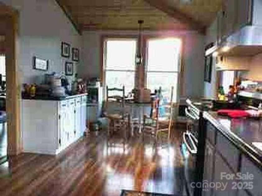 83 Kimberly Lane, Newland, NC 28657.  MLS# CAR4263748, YatesRealty ID 17257. Breakfast nook view from the kitchen.