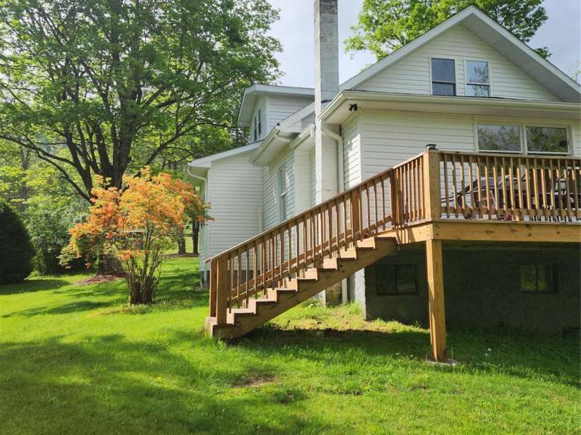 83 Kimberly Lane, Newland, NC 28657.  MLS# CAR4263748, YatesRealty ID 17257. View of back of home.