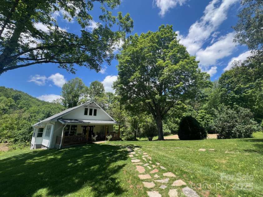 83 Kimberly Lane, Newland, NC 28657.  MLS# CAR4263748, YatesRealty ID 17257. Zoomed out view of front of the property.