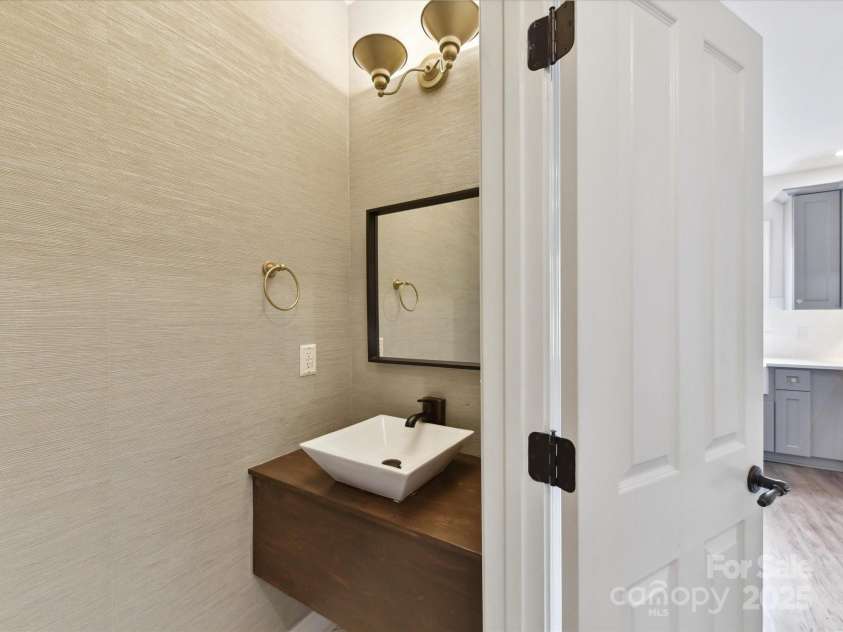 240 Faust Road, Davidson, NC 28036.  MLS# CAR4251499, YatesRealty ID 17264. Half bathroom