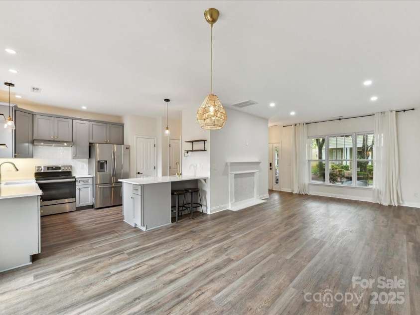 240 Faust Road, Davidson, NC 28036.  MLS# CAR4251499, YatesRealty ID 17264. Kitchen & living room