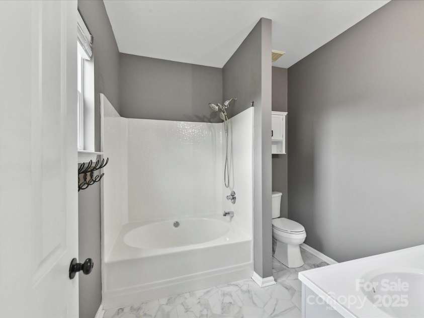 240 Faust Road, Davidson, NC 28036.  MLS# CAR4251499, YatesRealty ID 17264. Primary bathroom