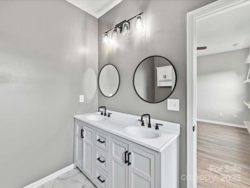 240 Faust Road, Davidson, NC 28036.  MLS# CAR4251499, YatesRealty ID 17264. Primary bathroom