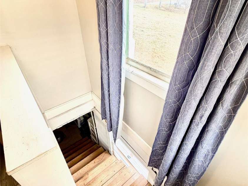 137 Clements Road, Rutherfordton, NC 28139.  MLS# CAR4342491, YatesRealty ID 17269. Step down into basement from the laundry room 