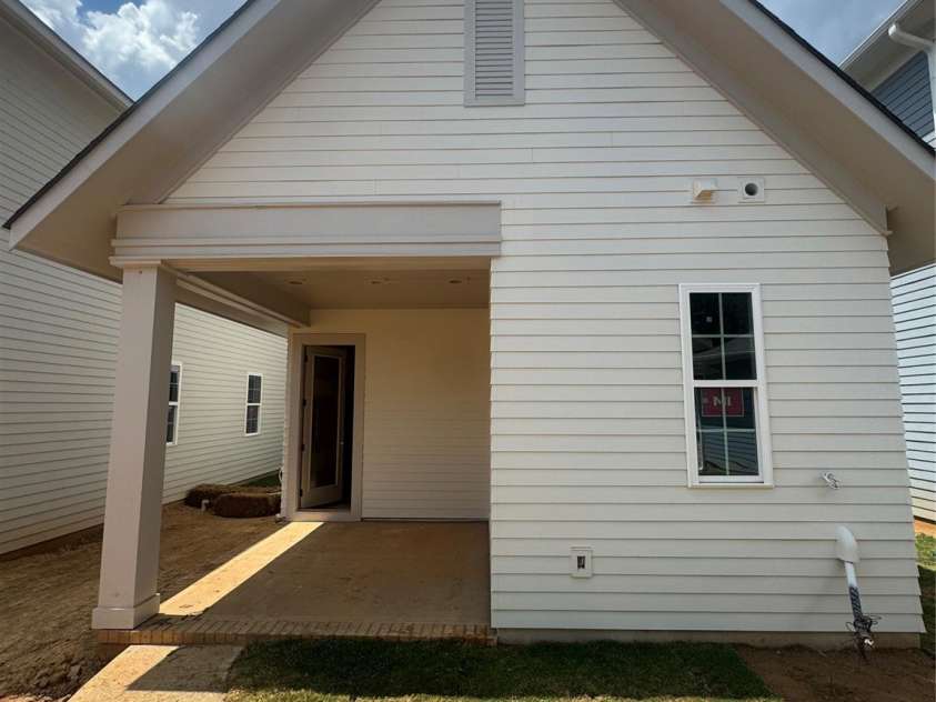 9113 Maybry Park Street, Charlotte, NC 28212.  MLS# CAR4265824, YatesRealty ID 17272. Back of home w/covered porch