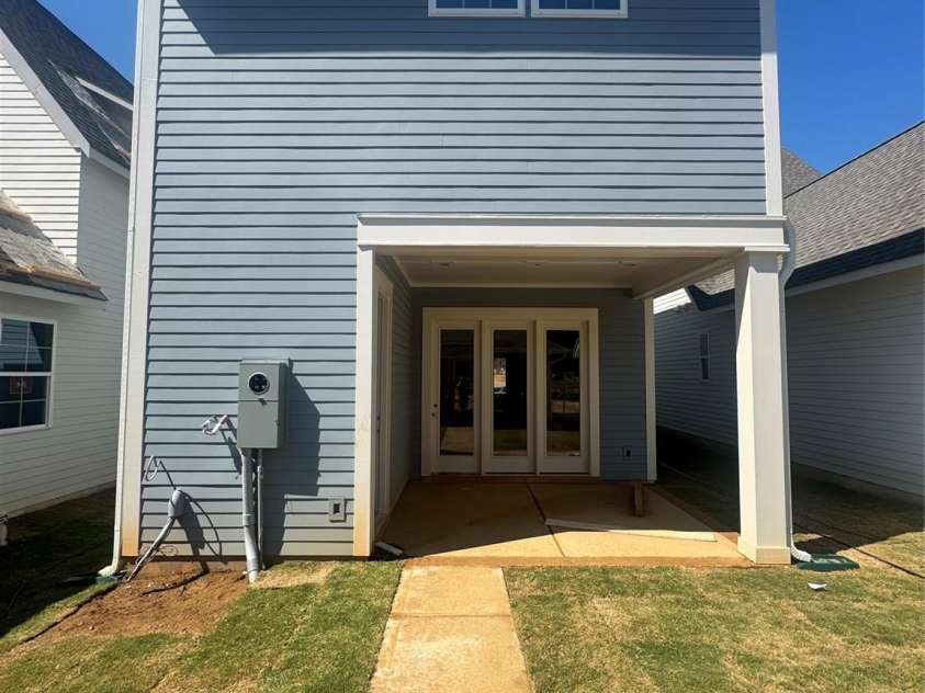 9109 Maybry Park Street, Charlotte, NC 28212.  MLS# CAR4261607, YatesRealty ID 17273. Backside of home with covered porch