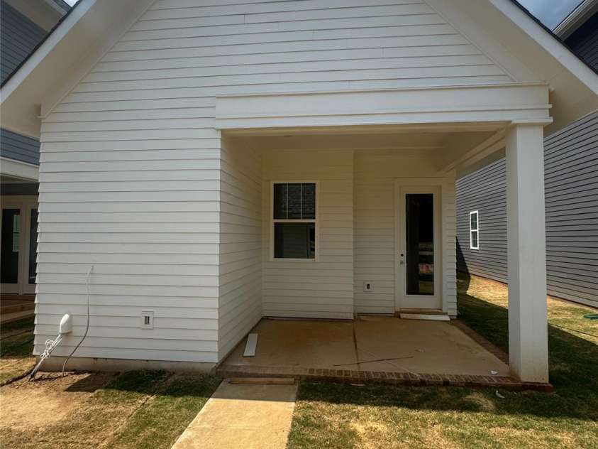 9105 Maybry Park Street, Charlotte, NC 28212.  MLS# CAR4258045, YatesRealty ID 17274. Backside of home w/covered porch