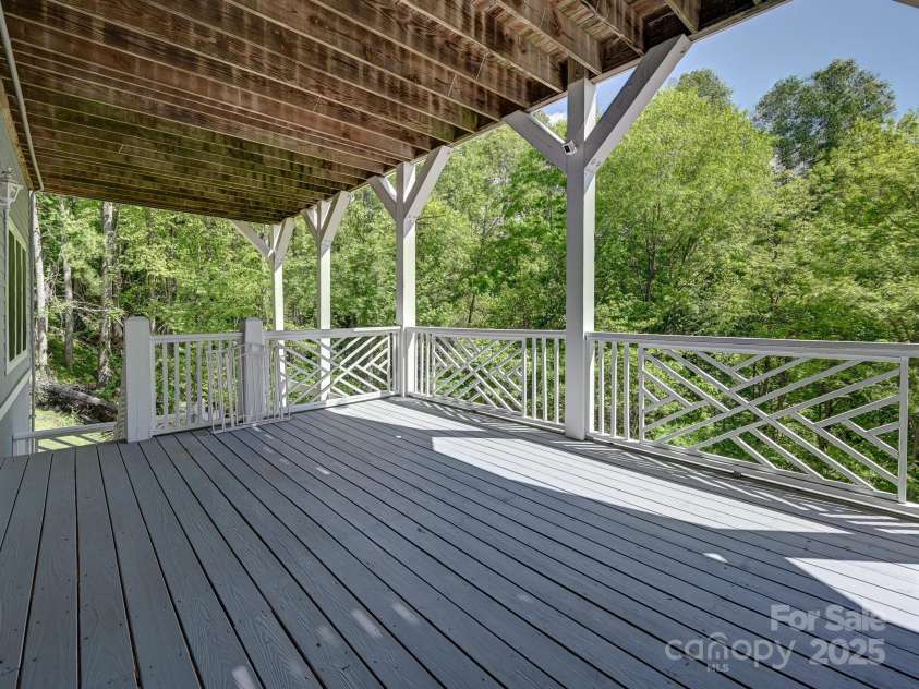 105 Spring Path, Hendersonville, NC 28739.  MLS# CAR4256171, YatesRealty ID 17277. 2nd lower level deck