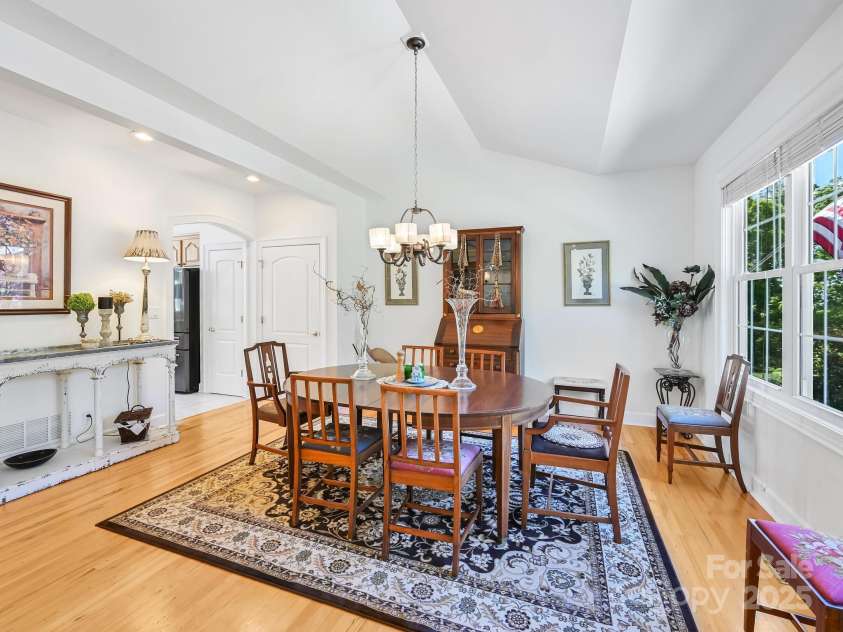 105 Spring Path, Hendersonville, NC 28739.  MLS# CAR4256171, YatesRealty ID 17277. Dining room with vaulted ceiling