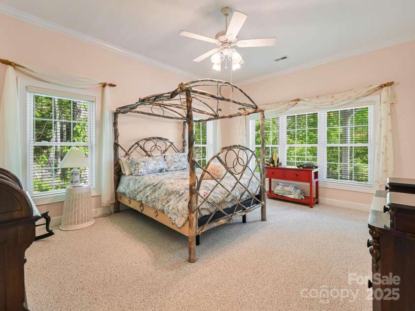 105 Spring Path, Hendersonville, NC 28739.  MLS# CAR4256171, YatesRealty ID 17277. Lower level guest bedroom