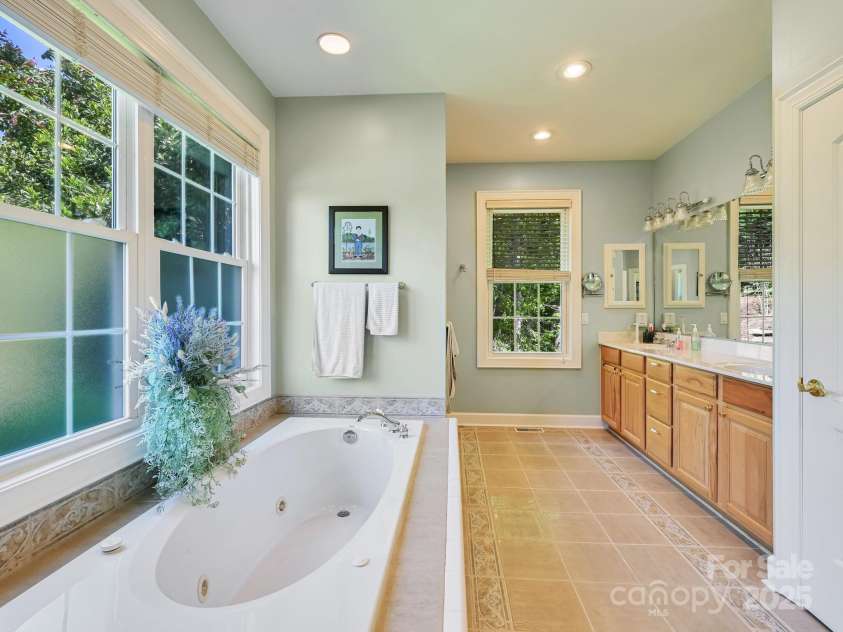 105 Spring Path, Hendersonville, NC 28739.  MLS# CAR4256171, YatesRealty ID 17277. Recessed lighting in Master bath