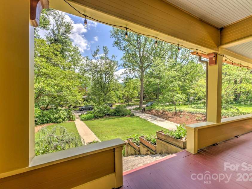 156 Cumberland Avenue, Asheville, NC 28801.  MLS# CAR4240356, YatesRealty ID 17278. Expansive Front Porch