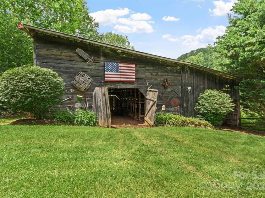 11820 State Highway 197 None, Burnsville, NC 28714.  MLS# CAR4264964, YatesRealty ID 17279. Back view of barn