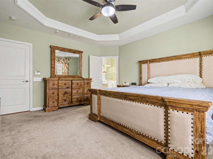 2124 Ashley River Road, Waxhaw, NC 28173.  MLS# CAR4347050, YatesRealty ID 17284. First Floor Primary bedroom