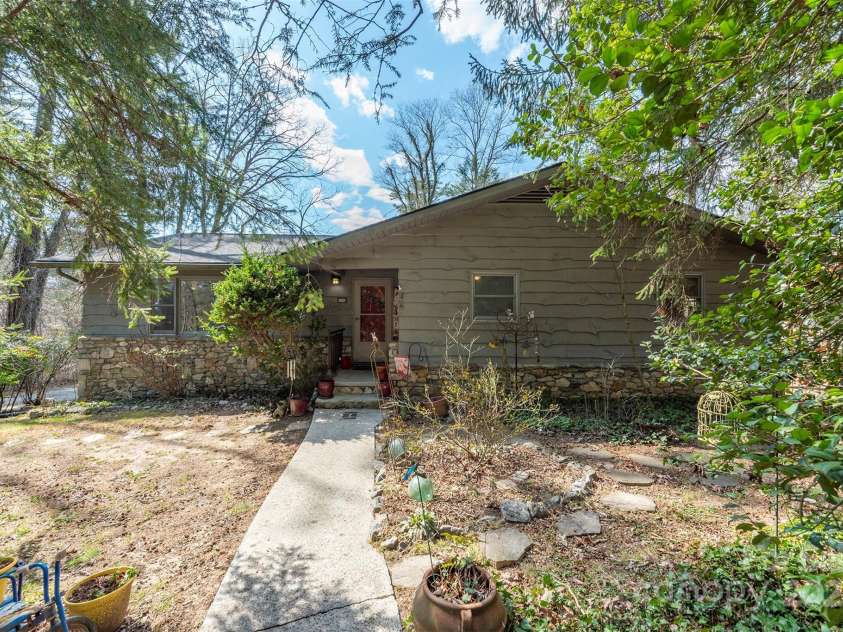 52 Oakhurst Road, Arden, NC 28704.  MLS# CAR4264311, YatesRealty ID 17288. Front of home