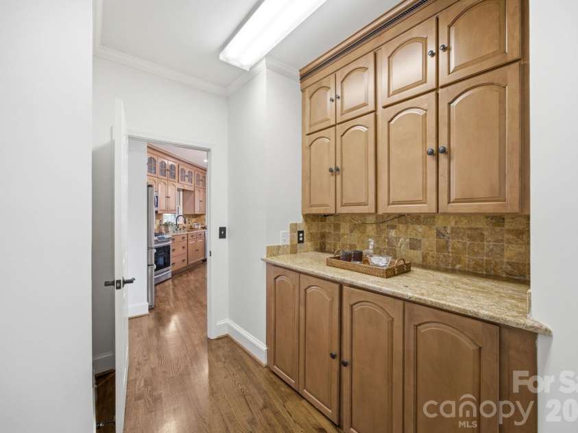 4122 Amarillo Drive, Concord, NC 28027.  MLS# CAR4404191, YatesRealty ID 17291. Wet bar, entering the kitchen