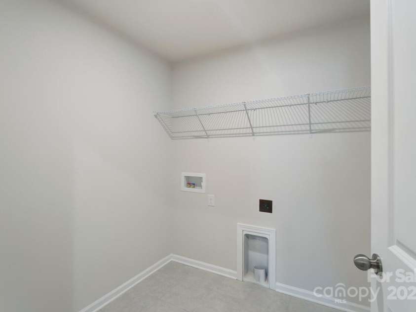 7220 Hodges Meadow Lane, Charlotte, NC 28213.  MLS# CAR4267228, YatesRealty ID 17291. Upstairs laundry room