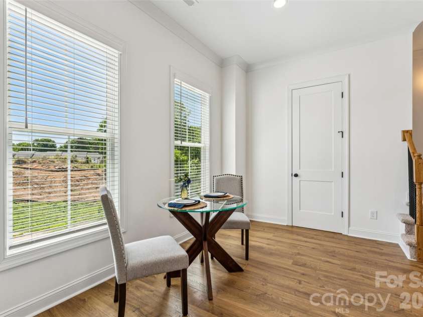 5860 Pittmon Lane, Kannapolis, NC 28081.  MLS# CAR4374434, YatesRealty ID 17292. Large windows by dining area