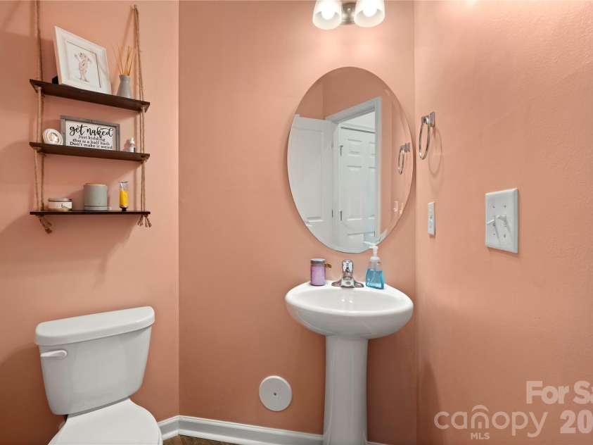 6132 Guildford Hill Lane, Charlotte, NC 28215.  MLS# CAR4373709, YatesRealty ID 17293. Main level half bath