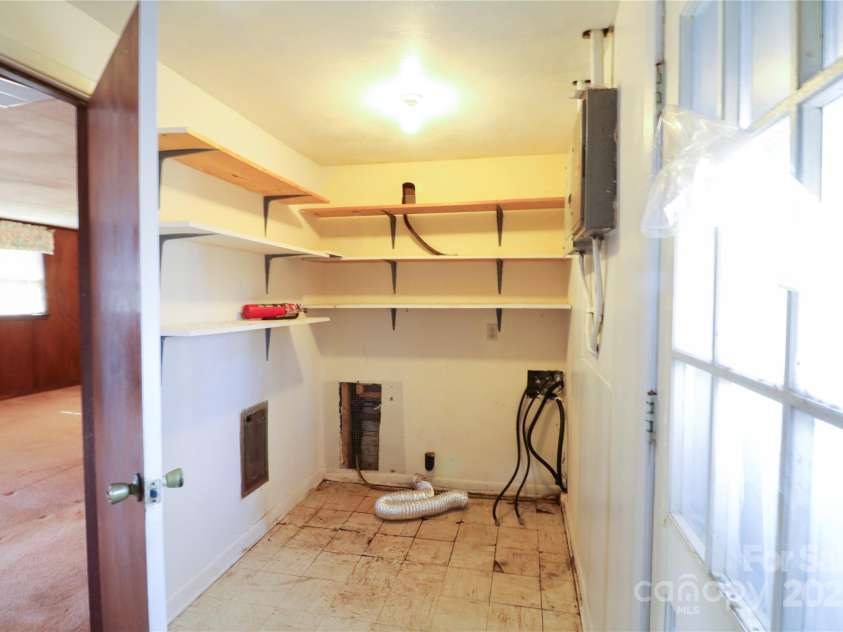 170 Heritage Lane, Salisbury, NC 28147.  MLS# CAR4263869, YatesRealty ID 17299. Laundry in above ground basement