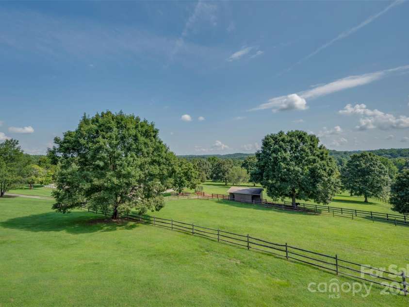 102 Uncle Coss Pond Road, Columbus, NC 28722.  MLS# CAR4267443, YatesRealty ID 17300. Well maintained pastures with newer fences.