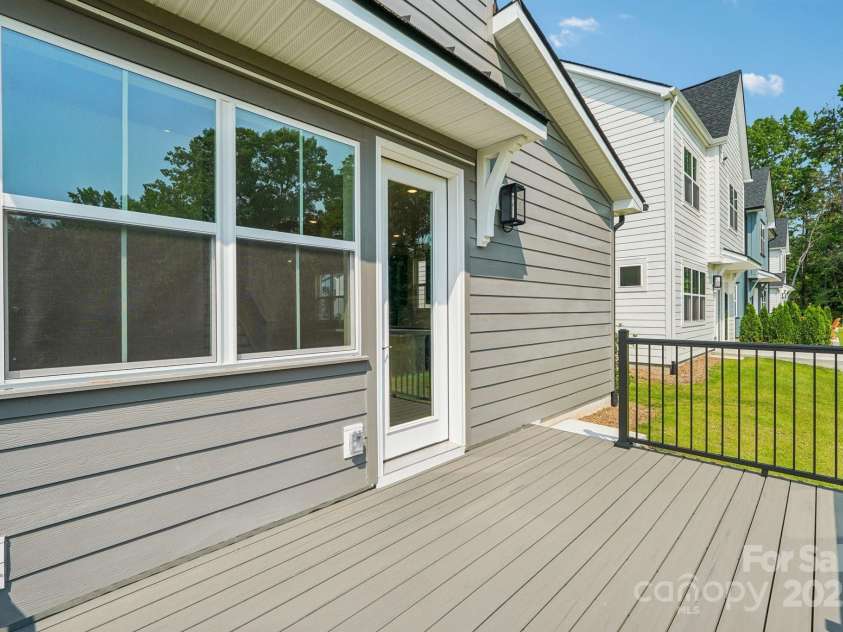 716 Flare Drive, Tega Cay, SC 29708.  MLS# CAR4267471, YatesRealty ID 17302. Rear deck