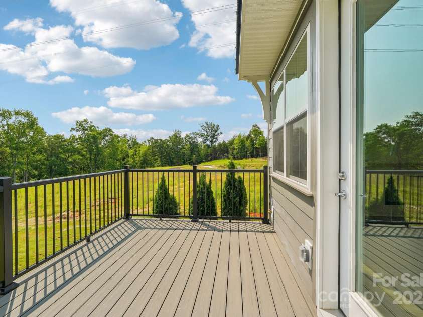 716 Flare Drive, Tega Cay, SC 29708.  MLS# CAR4267471, YatesRealty ID 17302. Rear deck