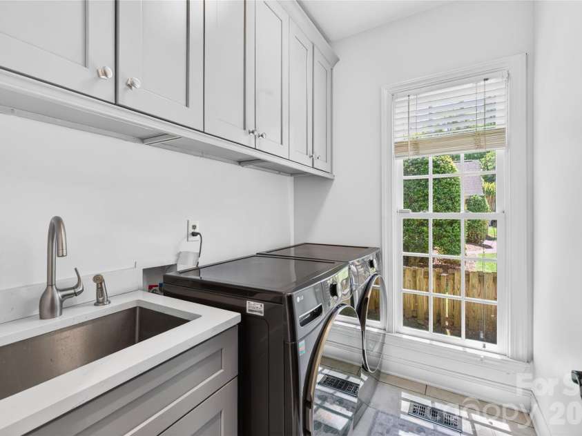 7331 Versailles Lane, Charlotte, NC 28277.  MLS# CAR4375821, YatesRealty ID 17303. Laundry on Main Floor