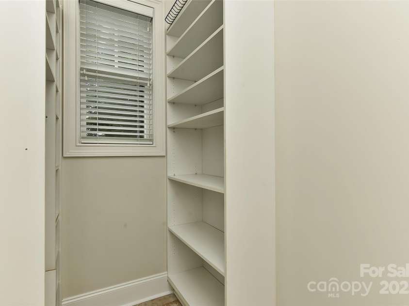 17210 Sulky Plough Road, Charlotte, NC 28277.  MLS# CAR4263867, YatesRealty ID 17305. Added shelving in laundry room