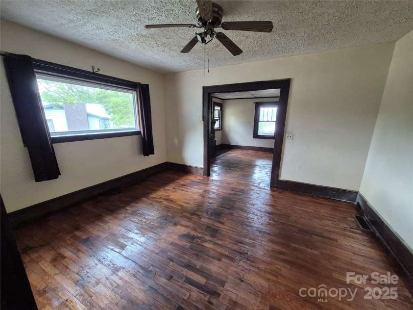 4 Three Dove Road, Candler, NC 28715.  MLS# CAR4258973, YatesRealty ID 17310. Dining room