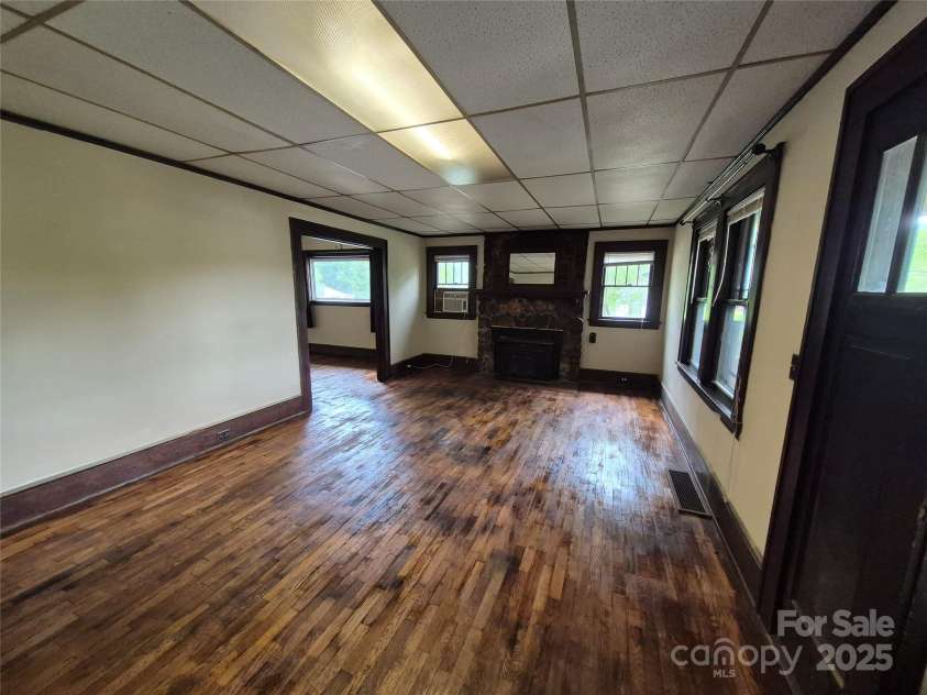 4 Three Dove Road, Candler, NC 28715.  MLS# CAR4258973, YatesRealty ID 17310. Living, fireplace