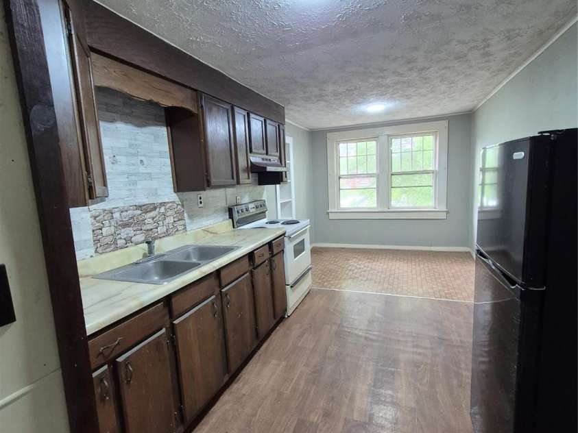 4 Three Dove Road, Candler, NC 28715.  MLS# CAR4258973, YatesRealty ID 17310. Upstairs kitchen