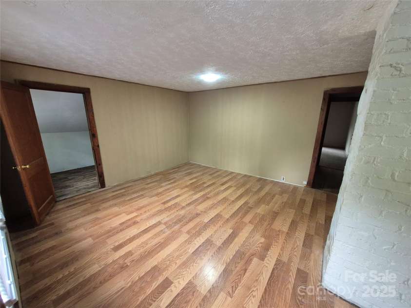 4 Three Dove Road, Candler, NC 28715.  MLS# CAR4258973, YatesRealty ID 17310. Upstairs living