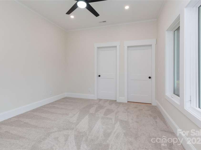 111 Laura Trace, Hendersonville, NC 28792.  MLS# CAR4211546, YatesRealty ID 17311. Downstairs Bedroom