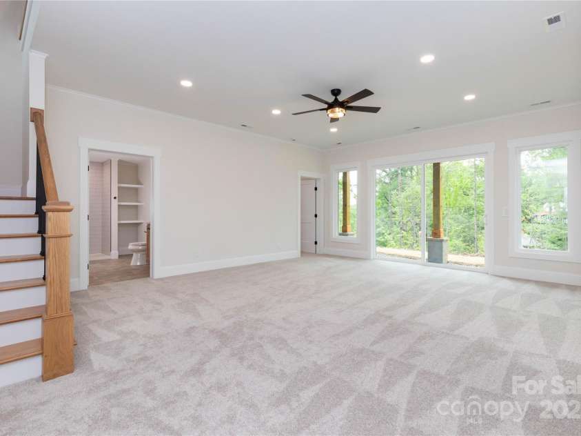 111 Laura Trace, Hendersonville, NC 28792.  MLS# CAR4211546, YatesRealty ID 17311. Downstairs Family Room