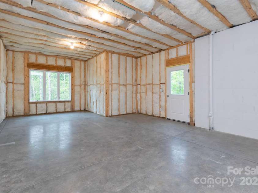 111 Laura Trace, Hendersonville, NC 28792.  MLS# CAR4211546, YatesRealty ID 17311. Downstairs Unfinished Space 1