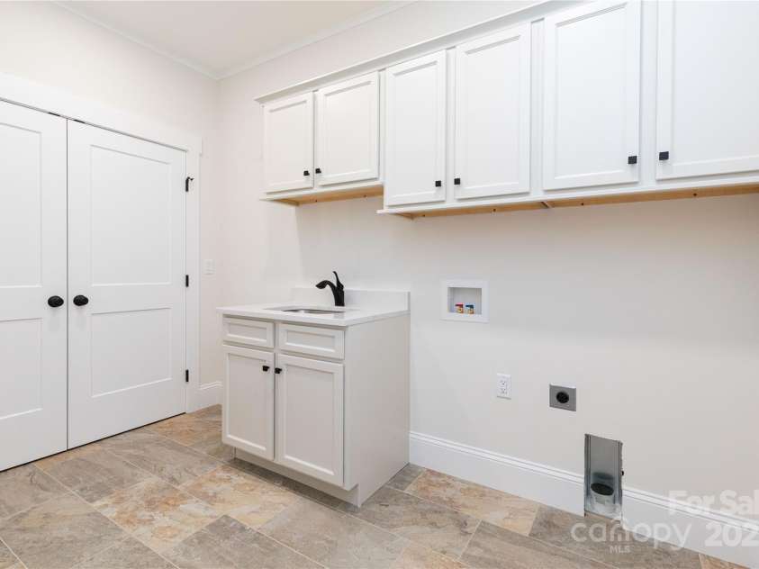 111 Laura Trace, Hendersonville, NC 28792.  MLS# CAR4211546, YatesRealty ID 17311. Laundry Room