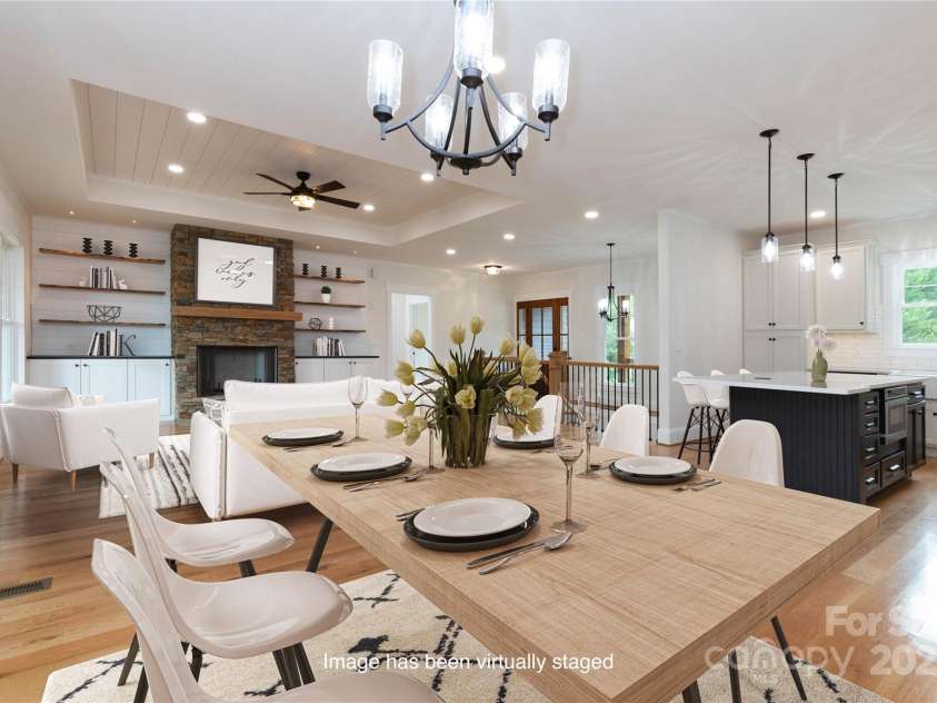 111 Laura Trace, Hendersonville, NC 28792.  MLS# CAR4211546, YatesRealty ID 17311. Living/Dining Room - Virtually Staged