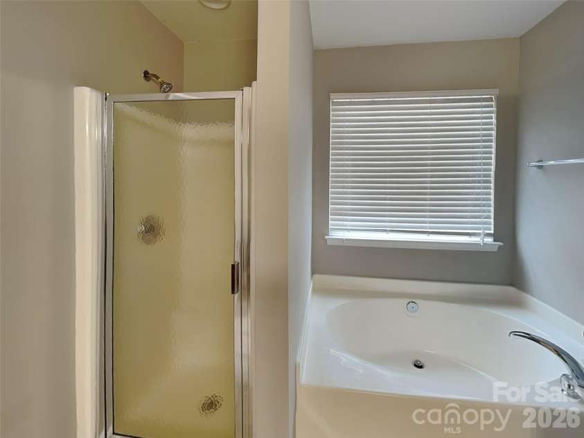 4208 Lawrence Daniel Drive, Matthews, NC 28104.  MLS# CAR4368967, YatesRealty ID 17320. Primary bathroom