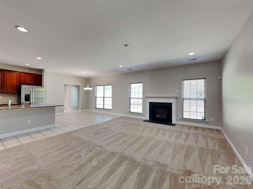 11206 Scottsman Trace Drive, Charlotte, NC 28273.  MLS# CAR4371475, YatesRealty ID 17327. Family room
