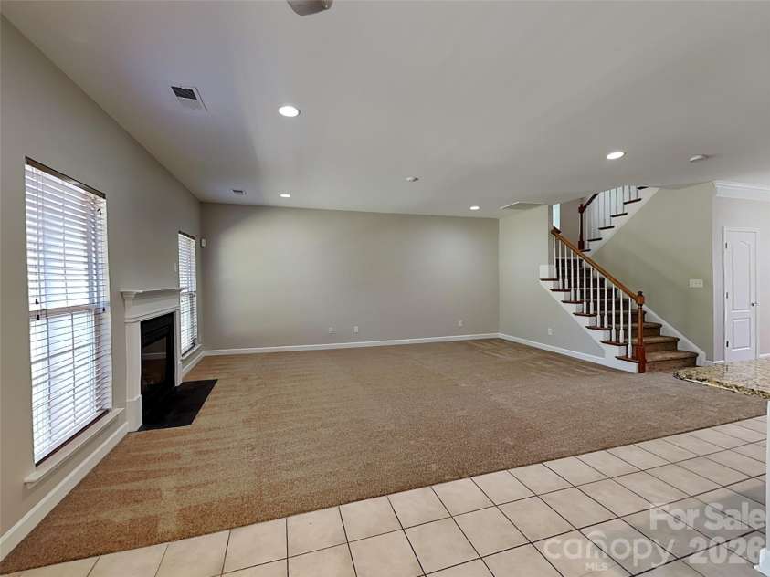 11206 Scottsman Trace Drive, Charlotte, NC 28273.  MLS# CAR4371475, YatesRealty ID 17327. Family room