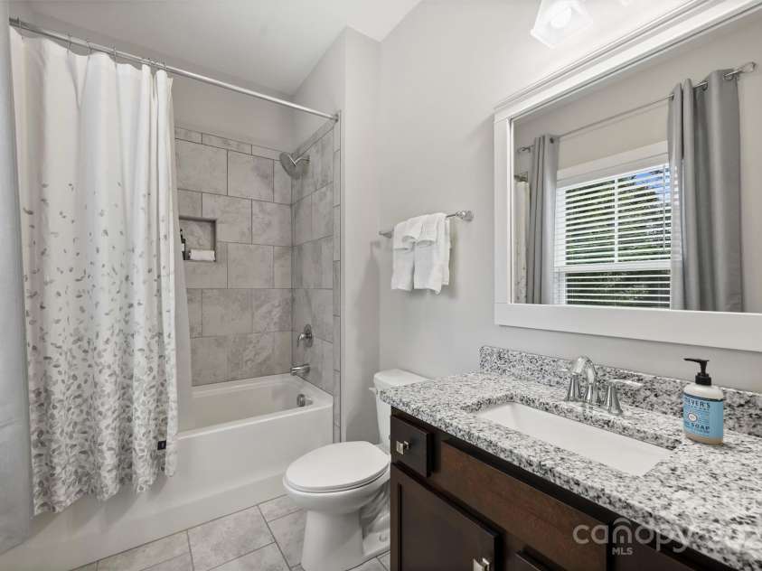 1209 Leigh Avenue, Charlotte, NC 28205.  MLS# CAR4295218, YatesRealty ID 17331. Ensuite bath in BR 2