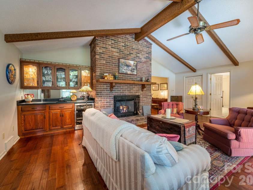 1955 Connestee Trail, Brevard, NC 28712.  MLS# CAR4313257, YatesRealty ID 17335. Beamed ceiling with fan