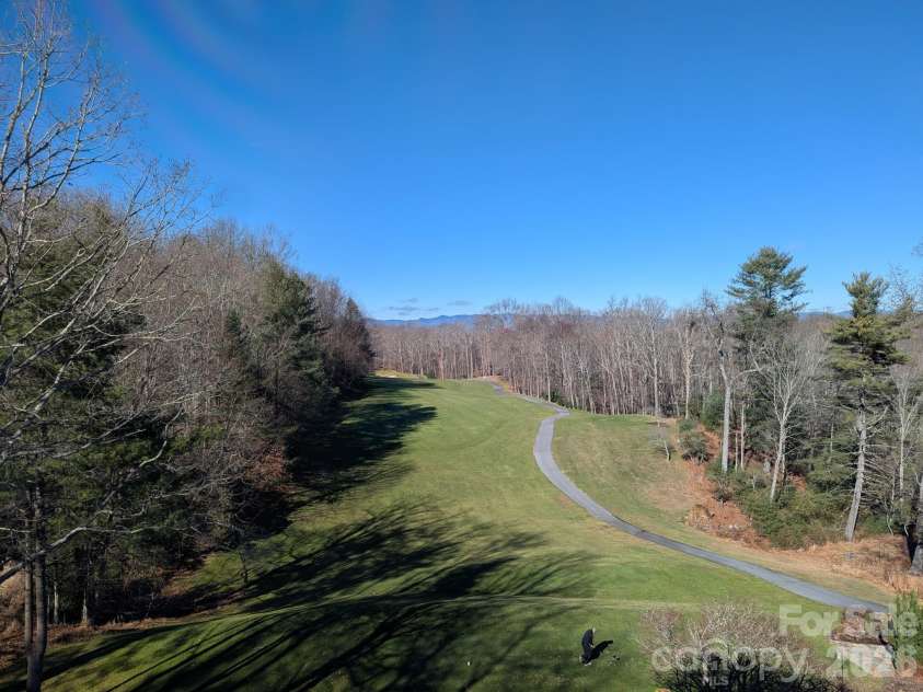 1955 Connestee Trail, Brevard, NC 28712.  MLS# CAR4313257, YatesRealty ID 17335. Championship 18 hole mountain course.