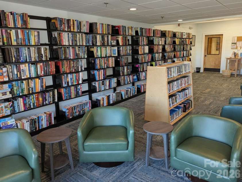 1955 Connestee Trail, Brevard, NC 28712.  MLS# CAR4313257, YatesRealty ID 17335. Clubhouse library