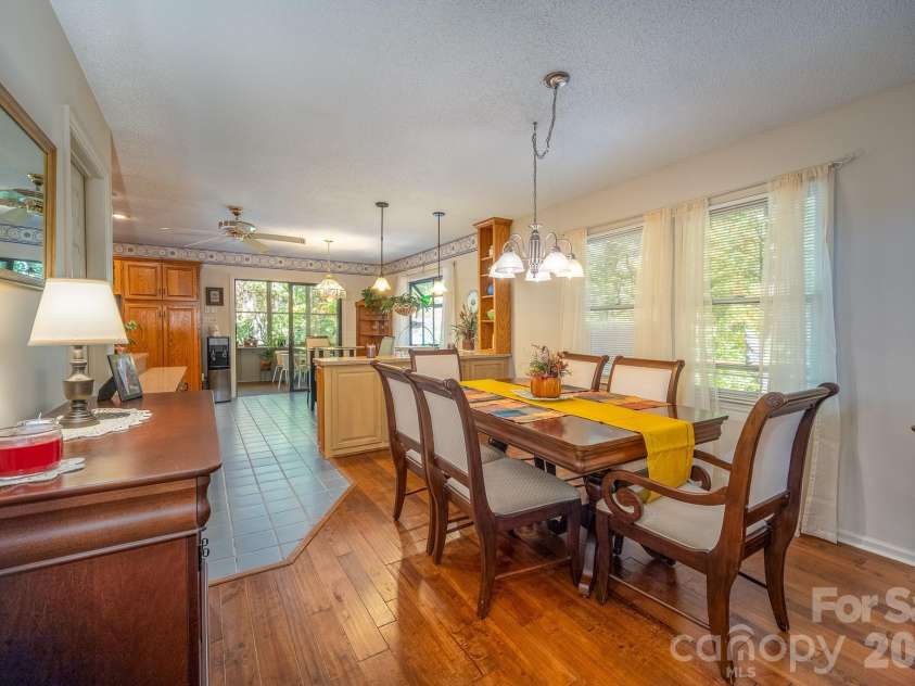 1955 Connestee Trail, Brevard, NC 28712.  MLS# CAR4313257, YatesRealty ID 17335. Formal dining area