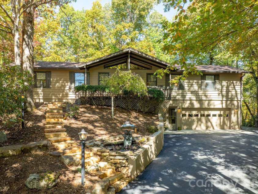 1955 Connestee Trail, Brevard, NC 28712.  MLS# CAR4313257, YatesRealty ID 17335. Front of house